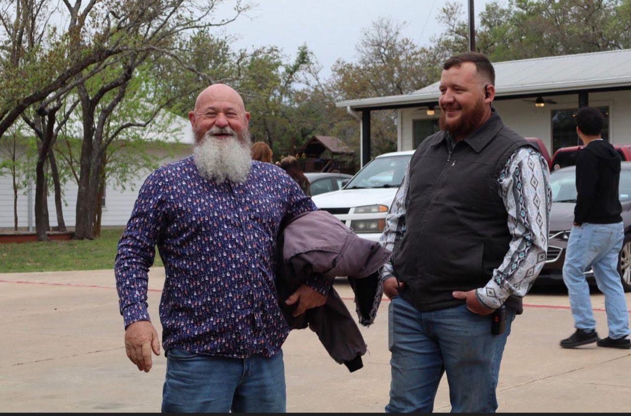 Two men enjoying a conversation outside church